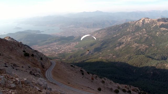 Extreme paragliding from mountain Babadag in Turkey near the city of Fethiye. Best feeling of adrenaline, euphoria and freedom at height from flight. Awesome energy of the ascending air currents.