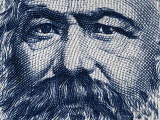 Karl Marx portrait on East German 100 mark (1975) banknote closeup macro, famous philosopher,...