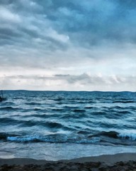 Hand drawing watercolor art on canvas. Artistic big print. Original modern painting. Acrylic dry brush background. Painting for sale. Beautiful autumn seascape. Strength sea waves. Grey azure clouds.