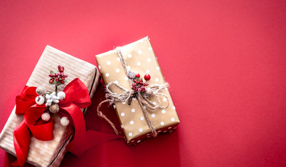 Christmas concept, two gift boxes on red background