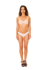 Full length beautiful slim tanned woman in bikini, isolated on white background