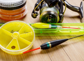 Fishing tackle on a wooden table