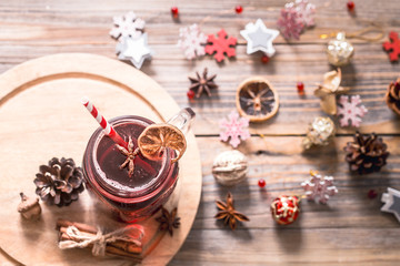 drink mulled wine on a wooden background
