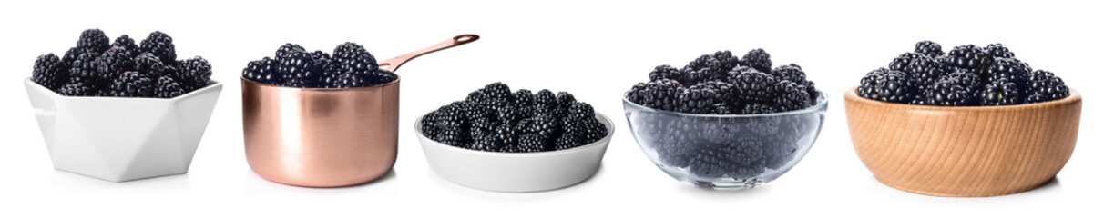 Set with fresh tasty blackberries in dishware on white background