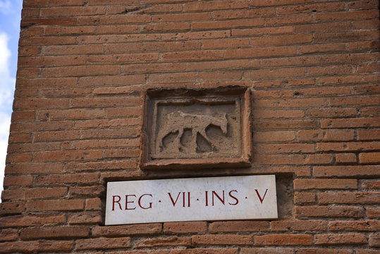 Street sign in the once buried Roman city of Pompeii south of Naples under the shadow of Mount Vesuvius Italy

