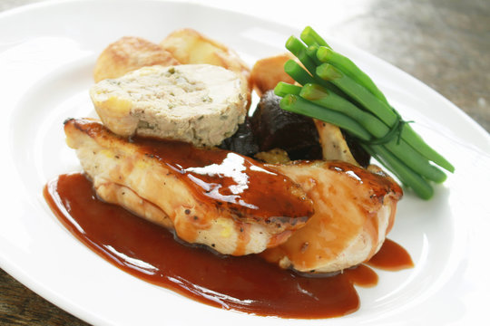 plated chicken with vegetables meal