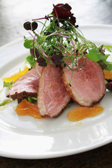 plated pan fried duck meal