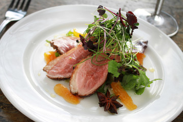 plated pan fried duck meal