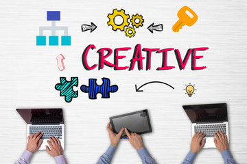 Top view on business people sitting in the office an using gadgets