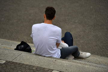 A young love couple at the Spree-river in the government district of Berlin Germany.