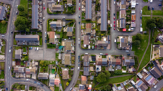 Top down aerial view of urban houses and streets in a residential area of a Welsh town