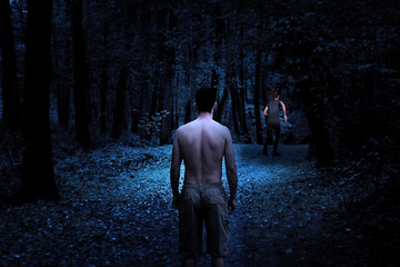 A young girl flees the forest in fear of an unknown young man. Night Scary Scene