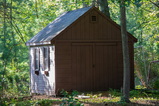 Brown shed with natural sunlight