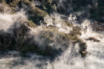 steam raising from the Frying Pan Lake in Waimangu Volcanic Valley, New Zealand