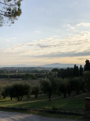 Misty sunrise over the Tuscan hills near Sinalunga, Tuscany