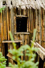 Weathered wooden window of old Colorado mine - 220724417