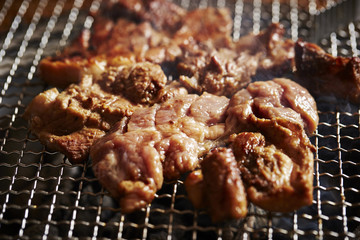 Grilling Korean marinated pork 