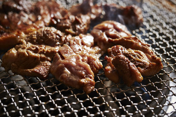 Grilling Korean marinated pork 
