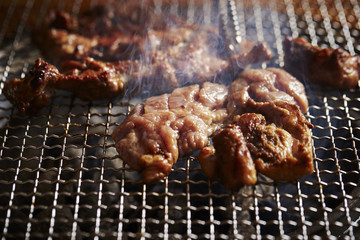 Grilling Korean marinated pork 