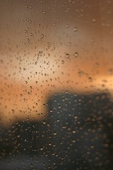 Texture detail of rain drop in window.