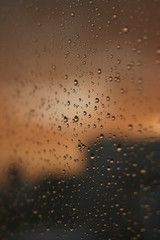 Naklejka na ściany i meble Texture detail of rain drop in window.