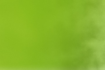 Texture of dirt on light green canvas sheet, abstract background