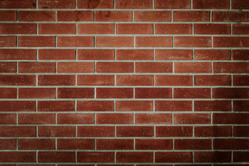 Fototapeta premium Red brick wall backgrund vintage industrial style indoor concept.
