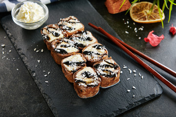 Sweet Chocolate Maki Sushi Pancake Rolls with Fruits Close Up