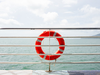 Red life ring on the ferry.