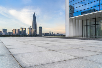 Panoramic skyline and buildings with empty square floor