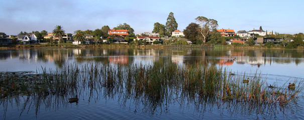houses on the bank of lake