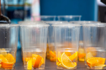 empty beverage glasses with orange slices