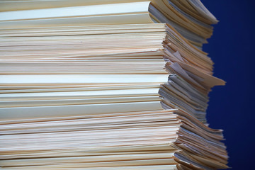 close up on the stacking documents and folders