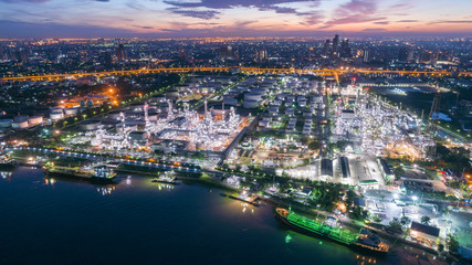 Naklejka premium Oil refinery factory for energy or gas industry background.