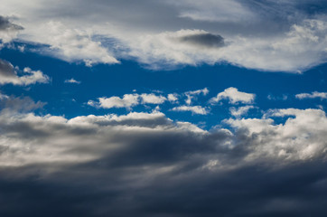 Dramatic sunset sky with colorful clouds after thunderstorm