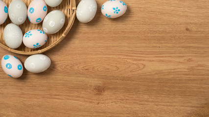 Handmade easter eggs a isolated on wooden background.