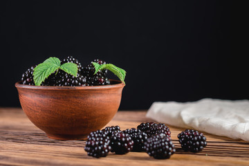 Blackberry on a wooden background