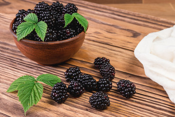 Blackberry on a wooden background
