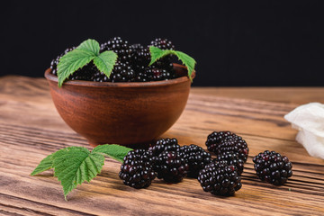 Blackberry on a wooden background
