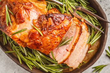 Baked pork with rosemary. White background, top view.