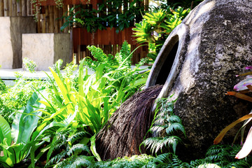 Old jar with decorated in garden.