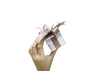 Hand holding a luxury luxurysmall gift box isolated on white background.