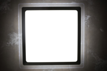 Square lamp in the blur. Texture for text