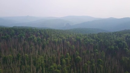 Beautiful colorful landscape at Krasnoyarsk stolby misty morning drone footage