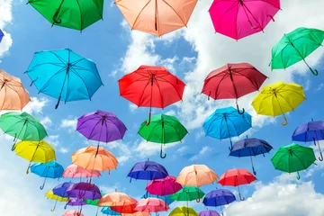 Fotobehang Background image, colorful of umbrella and sky © tapui