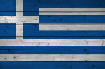 Flag of Greece on wooden background, surface. Wooden wall, planks. National flag.