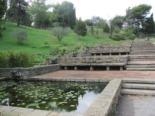 Fototapeta premium Beautiful scenery with southern trees and plants, park in Barcelona