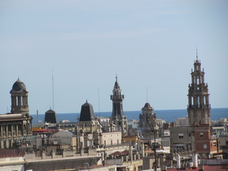 Obraz premium Panorama of Barcelona, beautiful view of the roofs of historic buildings