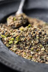 Fototapeten Dukkah, a nut and spice mixture from Egypt © anna.q