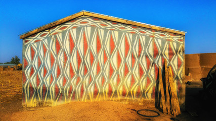 Ghana, northern region, fortified houses traditionally painted with bright colors of the Gurunsi...